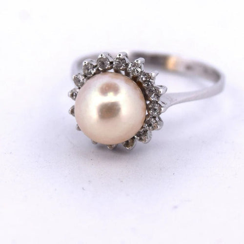 Bague 53 Bague en or blanc 18 carats avec perle naturelle et diamants 58 Facettes