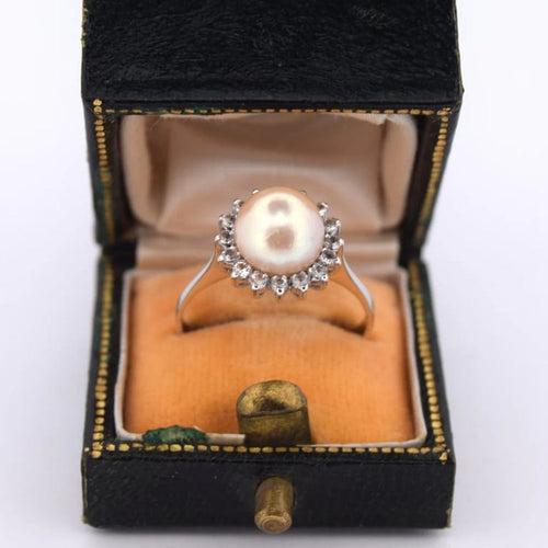 Bague 53 Bague en or blanc 18 carats avec perle naturelle et diamants 58 Facettes