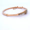 Bracelet Bracelet rigide vintage en or jaune 18 kt avec diamants 58 Facettes