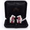 Boucles d'oreilles Boucles d’oreilles en platine et or jaune 18 carats rubis et diamants 58 Facettes