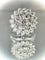 Bague 60 Bague fleur en or blanc 18 carats et diamants 58 Facettes