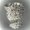Bague 60 Bague fleur en or blanc 18 carats et diamants 58 Facettes