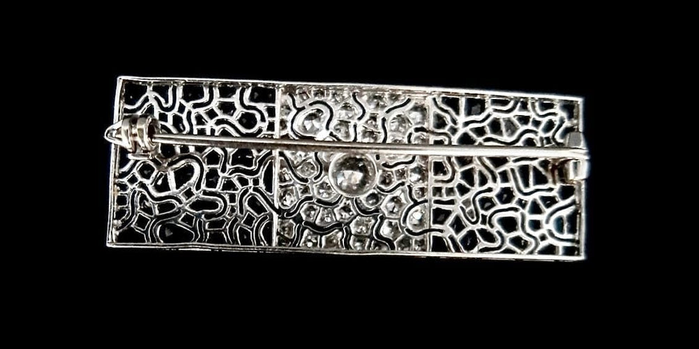 Broche Broche Art déco en platine sertie de saphirs et diamants 58 Facettes