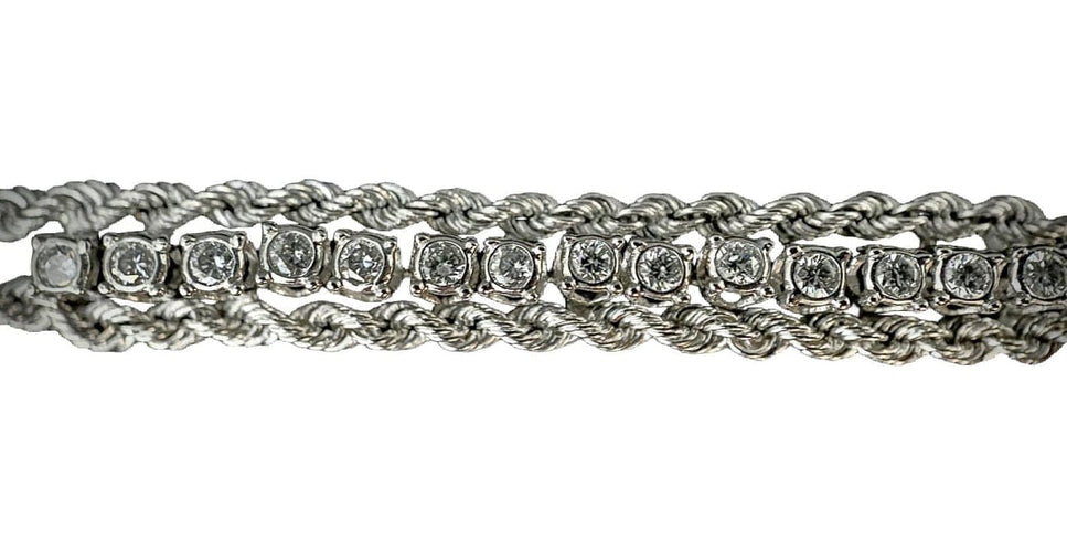 Bracelet Bracelet torsadé en or blanc 14 carats et diamants 58 Facettes