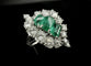 Bague 53 Bague en platine sertie d’émeraudes et de diamants 58 Facettes