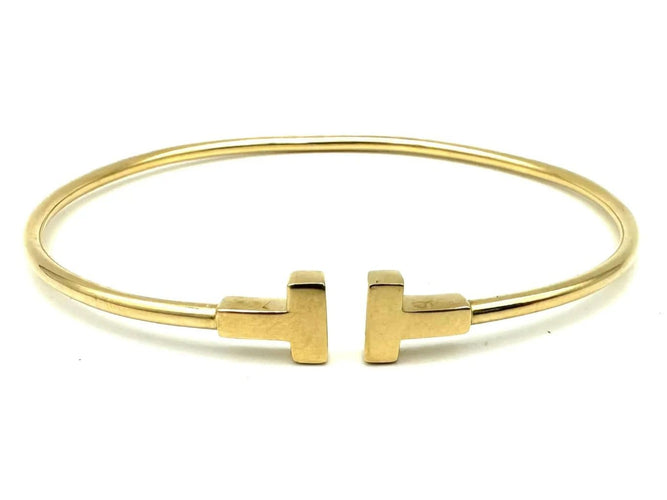 Bracelet Tiffany & Co. - Bracelet T Wire en or jaune 18K 58 Facettes