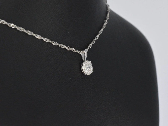 Pendentif Pendentif en or blanc avec diamants 58 Facettes 2074