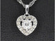 Pendentif Pendentif cœur en or blanc 14 carats avec diamants 58 Facettes 2082