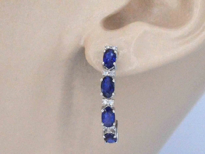 Boucles d'oreilles Boucles d’oreilles en or blanc 14 carats avec diamants et saphir 58 Facettes 2130