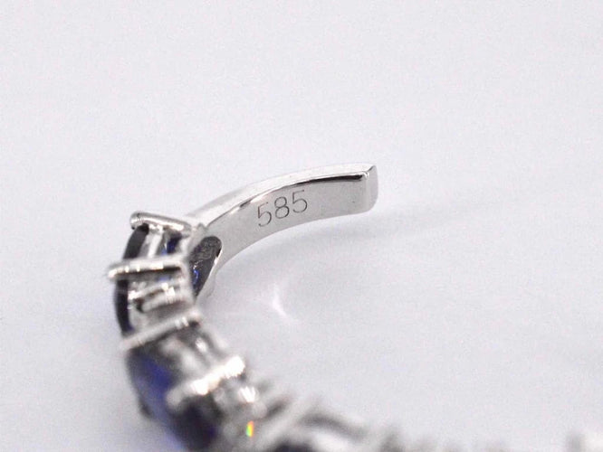 Boucles d'oreilles Boucles d’oreilles en or blanc 14 carats avec diamants et saphir 58 Facettes 2130