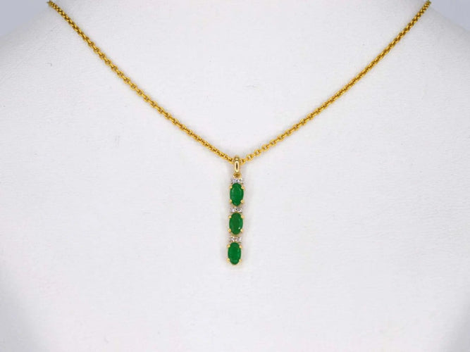 Pendentif Pendentif en or 14 carats avec diamant et émeraude 58 Facettes 2141