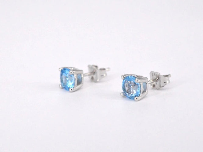 Boucles d'oreilles Boucles d’oreilles en or blanc 14 carats avec topaze et diamant 58 Facettes 2201