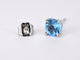 Boucles d'oreilles Boucles d’oreilles en or blanc 14 carats avec topaze et diamant 58 Facettes 2201