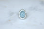 Bague 53.5 Bague marguerite cabochon en or blanc et platine, aigue-marine et diamants 58 Facettes