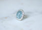 Bague 53.5 Bague marguerite cabochon en or blanc et platine, aigue-marine et diamants 58 Facettes