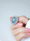 Bague 53.5 Bague marguerite cabochon en or blanc et platine, aigue-marine et diamants 58 Facettes