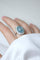 Bague 53.5 Bague marguerite cabochon en or blanc et platine, aigue-marine et diamants 58 Facettes