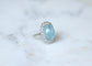 Bague 53.5 Bague marguerite cabochon en or blanc et platine, aigue-marine et diamants 58 Facettes