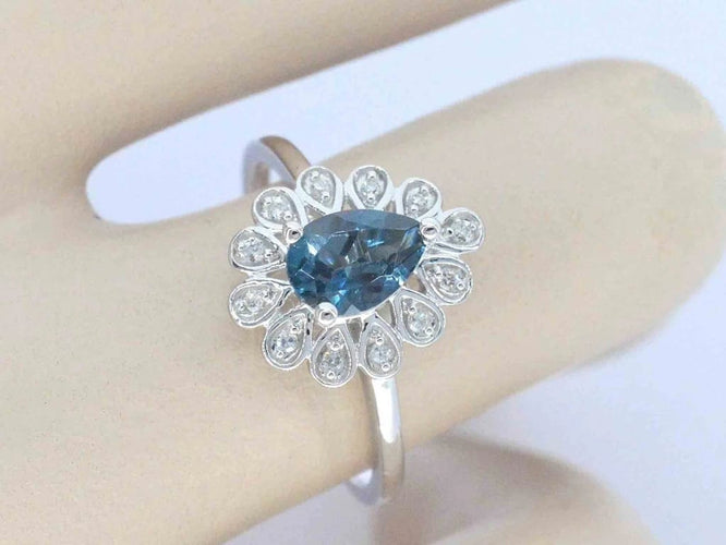 Bague 54 Bague en or blanc 14 carats avec diamants et topaze 58 Facettes 2316
