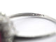 Bague 54 Bague entourage en or blanc 14 carats avec rubis et diamants 58 Facettes 2346
