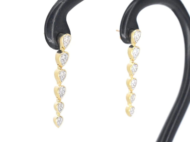 Boucles d'oreilles Boucles d'oreilles en or jaune 14 carats avec diamants 58 Facettes 2339