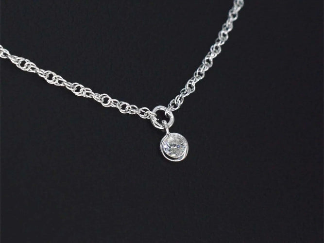 Collier Collier en or blanc 14 carats avec diamant 0,05 ct 58 Facettes 2352
