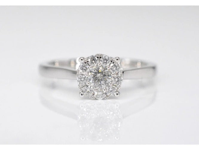 Bague 54 Bague entourage en or blanc 14 carats avec diamants 58 Facettes 2003