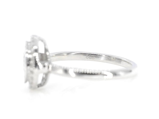 Bague 54 Bague entourage en or blanc 14 carats avec diamants 58 Facettes 2005