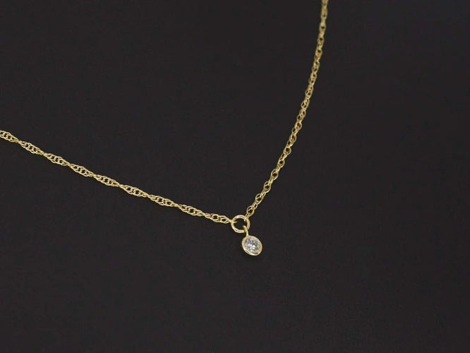 Collier Collier en or jaune 14 carats avec diamant naturel 58 Facettes 2353