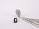 Boucles d'oreilles Boucles d’oreilles en or blanc 14 carats serties de diamants 58 Facettes 2159
