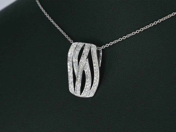 Pendentif Pendentif design en or blanc et diamants 58 Facettes 2242