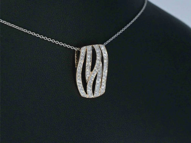 Pendentif Pendentif design en or rose et diamants 58 Facettes 2244