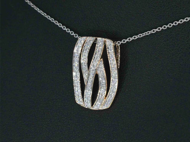 Pendentif Pendentif design en or rose et diamants 58 Facettes 2244