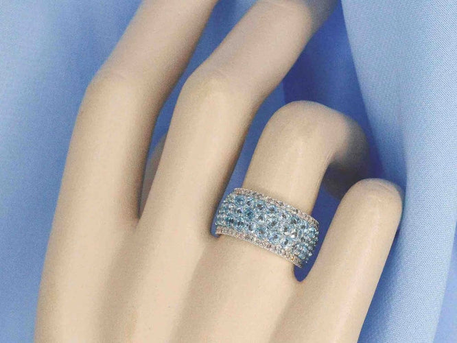 Bague 54 Bague en or blanc 14 carats avec topaze et diamants 58 Facettes 2356