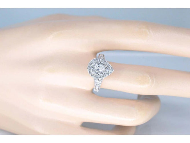 Bague 54 Bague entourage forme poire en or blanc 14 carats et diamants 58 Facettes 2048
