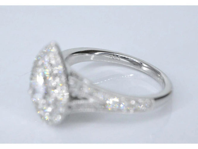 Bague 54 Bague entourage forme poire en or blanc 14 carats et diamants 58 Facettes 2048