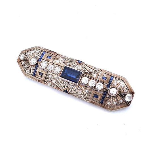 Broche Broche années 1940 en or blanc 18 carats, saphirs et diamants 58 Facettes