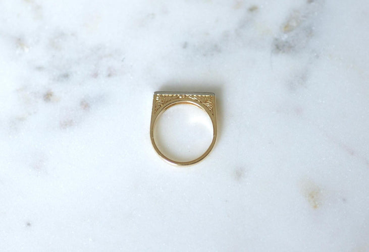 Bague 52 Bague Jarretière Art Déco en or jaune et blanc 18 kt, diamants 58 Facettes