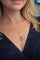 Collier Collier avec pendentif en or jaune 18 carats, émeraude colombienne et diamants 58 Facettes 50185