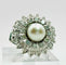 Bague 54 Bague motif floral en or blanc avec perle et diamants 58 Facettes 50277