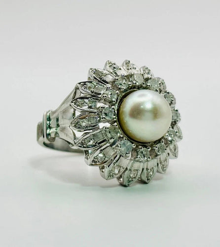 Bague 54 Bague motif floral en or blanc avec perle et diamants 58 Facettes 50277