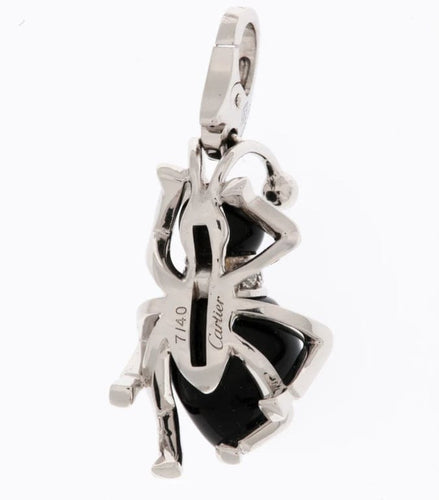 Broche Cartier - Broche La Fourmi en or blanc 18 carats, diamants et onyx 58 Facettes