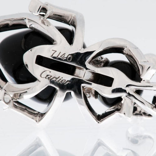 Broche Cartier - Broche La Fourmi en or blanc 18 carats, diamants et onyx 58 Facettes