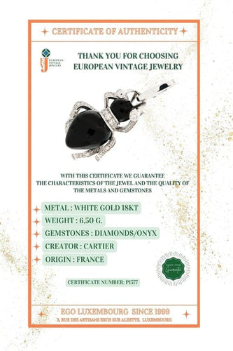 Broche Cartier - Broche La Fourmi en or blanc 18 carats, diamants et onyx 58 Facettes