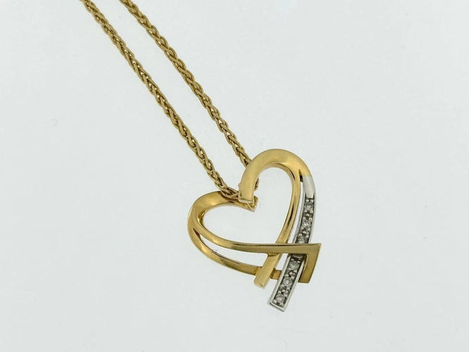 Collier Guy Laroche - Pendentif cœur avec chaîne en or jaune et blanc et diamants 58 Facettes