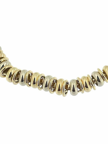 Collier Urbano - Collier tubulaire en or jaune et or blanc 58 Facettes
