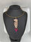 Pendentif Pendentif panthère en or rose 18 carats avec diamants, onyx et rubis 58 Facettes