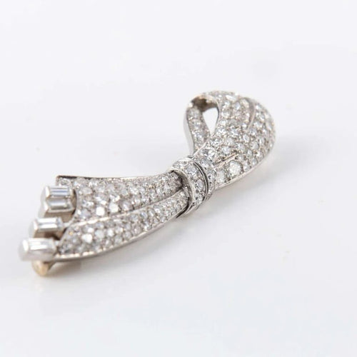 Broche Broche nœud en platine et diamants 58 Facettes 1