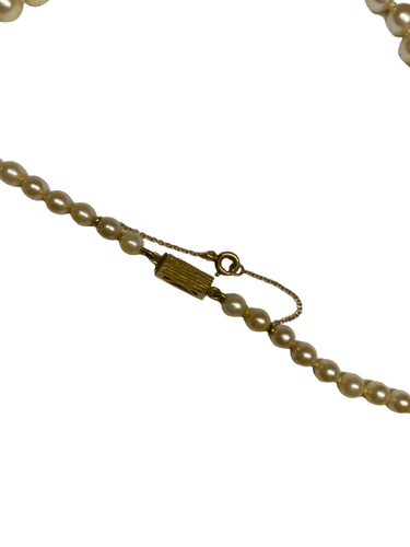 Collier Collier de perles dégradées avec fermoir en or jaune 18K 58 Facettes