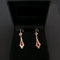 Boucles d'oreilles Boucles d’oreilles dormeuses en or 18 carats bicolore et pierres rouges 58 Facettes